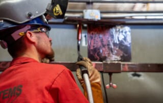 Student enrolled in on the job training for welding