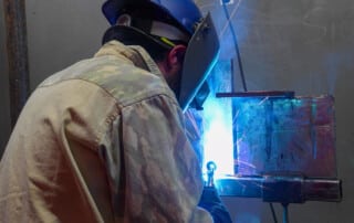 Student gets paid while learning in welder training program at The Systems Group